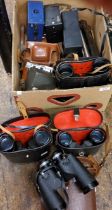 A pair of Swift Skipper 7 x 50 binoculars, cased;  others, Militus 10 x 50, cased;  Regent 7 x 50,