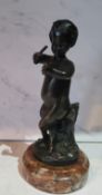 After Clodion, a dark patinated bronze, Young Satyr, signed, 16cm high