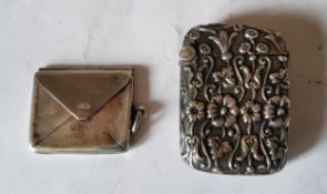 A Victorian silver plated vesta case, cast with stylised flowers, 4cm high, c.1890;  a silver