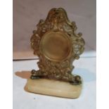 A 19th century rococo cast metal pocket watch stand, alabaster base, 12.5cm high, c.1870