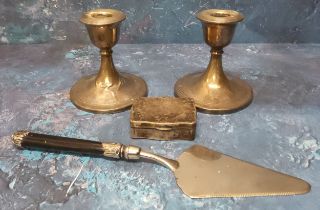 A pair of silver boudoir candlesticks, filled, S Blanckensee & Son Ltd,  Birmingham 1917; a late