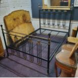 A modern Victorian style cast metal double bed with mattress support