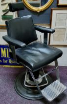 A 1950s Belmont barbers chairs, adjustable headrest, chromed fittings, on stepped weighted base.