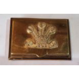 A 19th century brass rectangular snuff box, the cover with Prince of Wales feathers, 7.5cm wide, c.