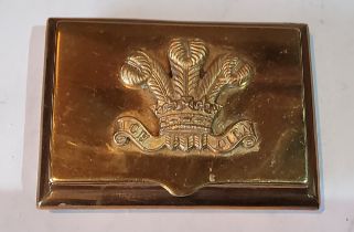 A 19th century brass rectangular snuff box, the cover with Prince of Wales feathers, 7.5cm wide, c.