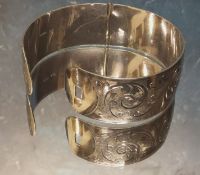 A Charles Horner hinged bangle/cuff, chased and engraved with scrolls, Charles Horner, Chester, 1937