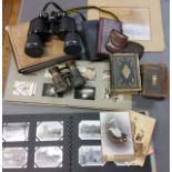 A pair of early 20th century binoculars;  Miranda 10 x 50 binoculars, cased;  photograph albums;