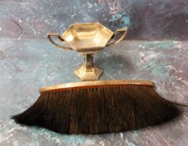 A silver two-handled pedestal hexagonal trophy cup, 9cm high, Sheffield 1937, 128g, 4.12toz;  a