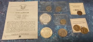 A Morgan Dollar, 1921, cased with COA; another loose; a Liberty Half Dollar, 1979; an Indian Head