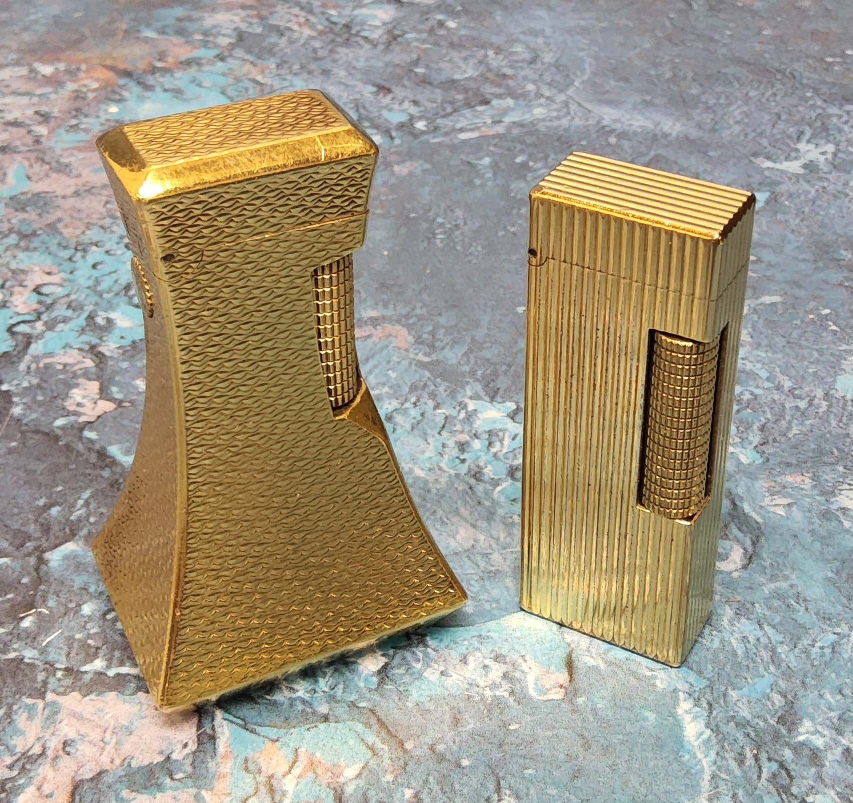 A Dunhill Deluxe gold plated table/desk lighter, signed Dunhill; a Dunhill gold plated lighter