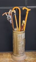 A horn hafted walking stick;  others;  a shooting stick;  etc
