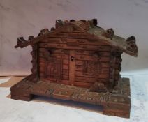 A Black Forest novelty jewellery box, in the form of a chalet, 13.5cm high