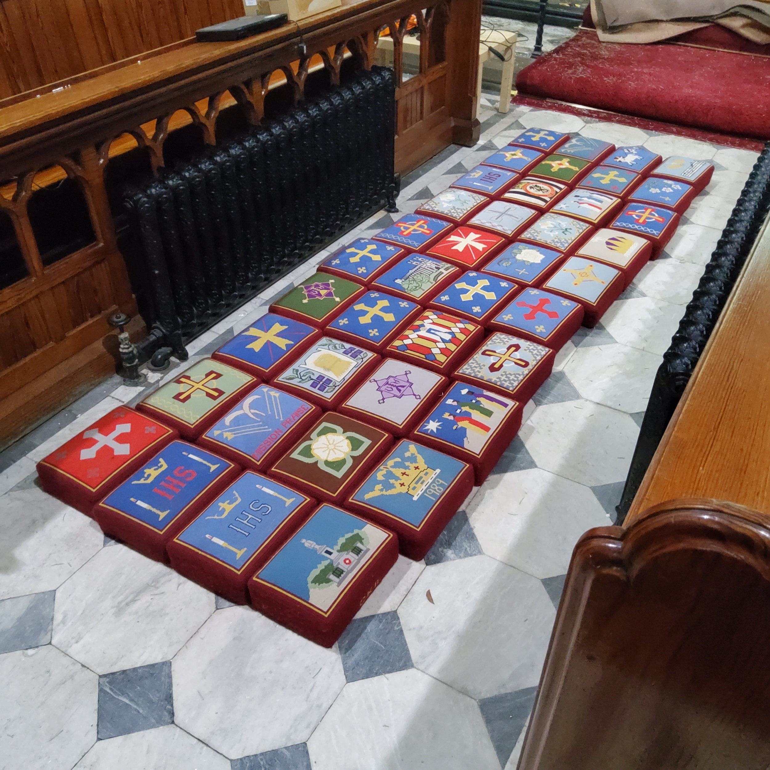 A harlequin set of fourty ecclesiastical hassocks / worshipping prayer stools, each with unique - Image 2 of 5