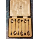A set of six silver coffee bean spoons, Walker and Hall, Sheffield 1922, cased
