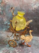 A French Palais-Royal novelty scent carriage, with vaseline glass holder, supported in a carriage