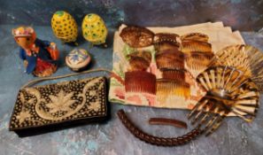 An Old Tupton Ware trinket box, tube lined with iris, boxed;  a pair of porcelain egg shaped trinket