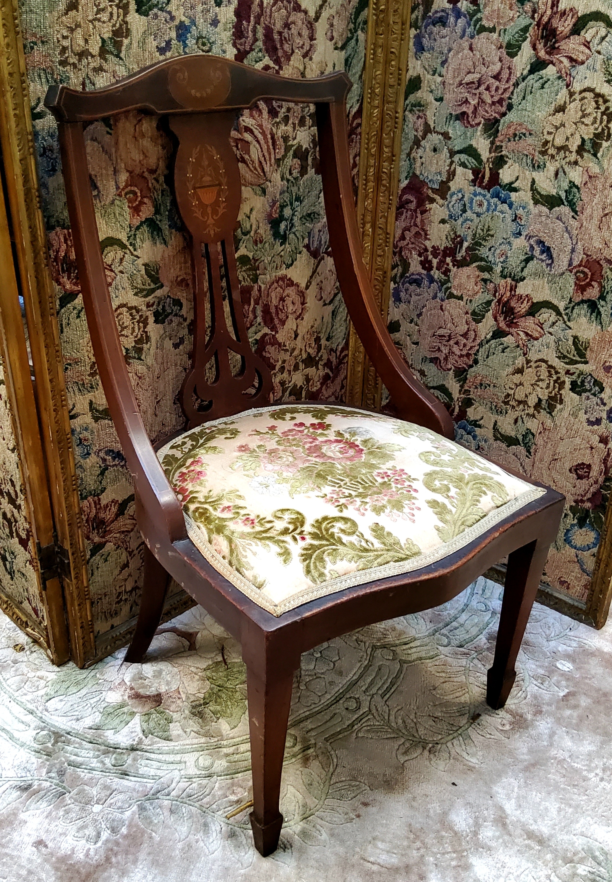 An Edwardian Sheraton Revival nursing chair c.1910