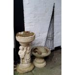 A small reconstituted stone campana shaped bird bath, another larger with figural putti plinth (used