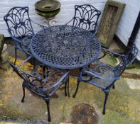 A Nova outdoor furniture set, including cast metal table and four Art Nouveau inspired armchairs