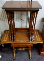 A nest of Regency style occasional tables; a tooled leather inlaid wine table (2)