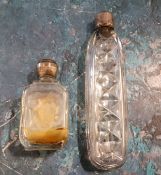 A George III cut glass scent bottle, silver screw-off cover, 15cm long, c.1810;   another, with