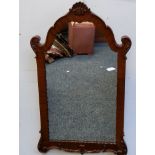 A George II style mahogany shaped rectangular mirror, shell and scroll frieze, 75cm x 46cm, 20th