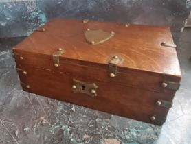 A late Victorian oak cigar box, bold shield cartouche, and 'rivets', 8cm high, 21cm wide, c.1890