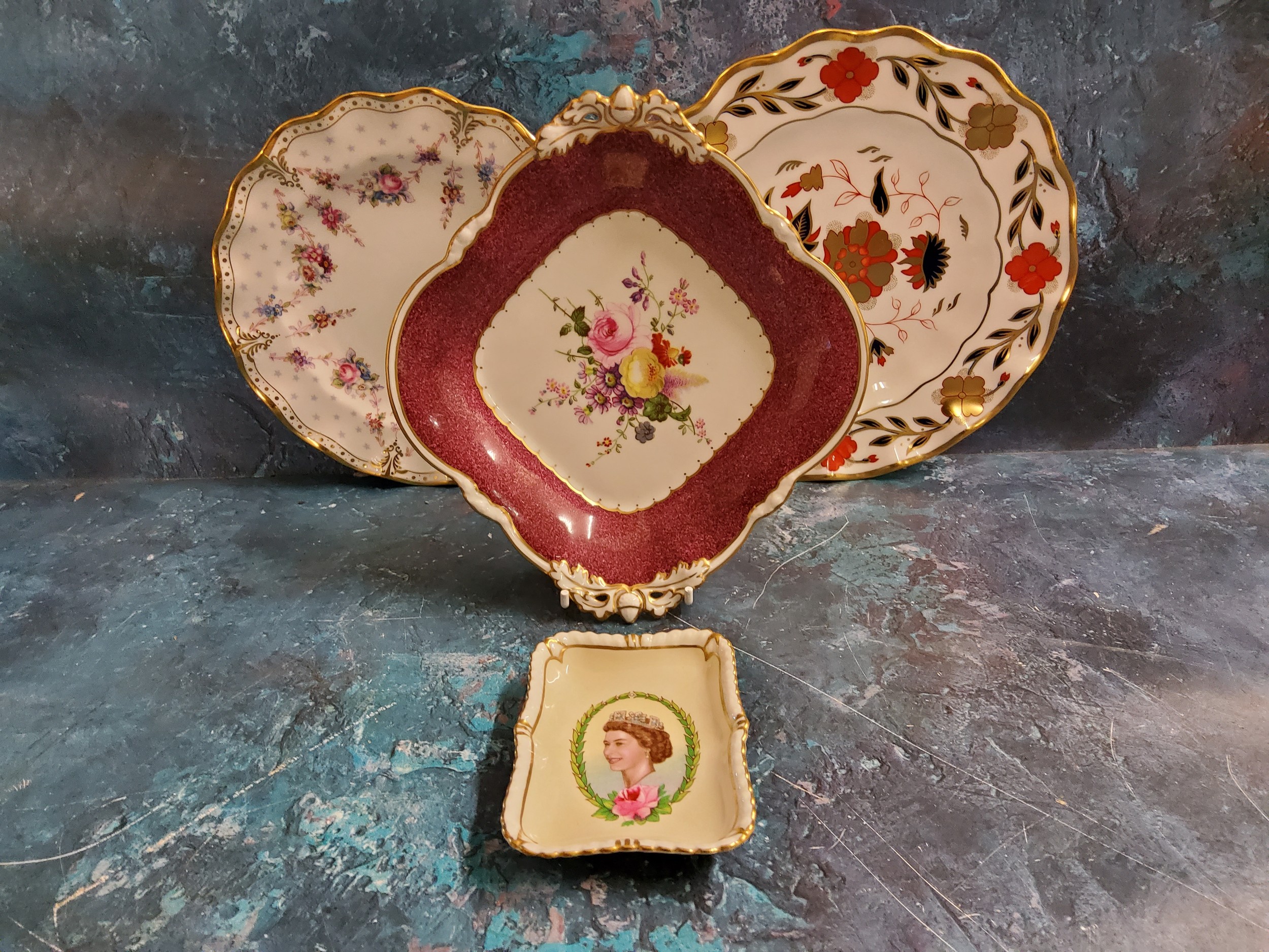 A Royal Crown Derby shaped square dish, the field with summer flowers, acorn handles, date code