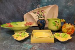 A Carlton Ware Primrose pattern pedestal bowl, 2176;  a similar jug;  two preserve dishes and knife;
