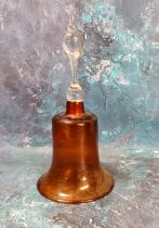 A Victorian cranberry glass bell, clear handle, with clanger, 32cm high, c.1880