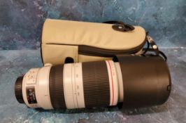 A Canon lens EF 100-400mm image stabilizer, ET-83D hood