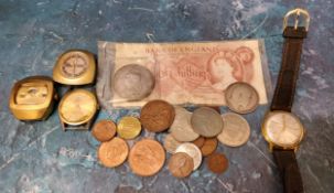 A Ten Shillings note;  a Victorian 1889 crown;  others coins;  watch parts