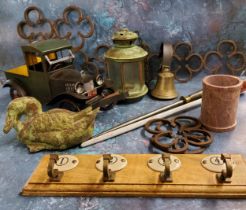 Boxes and Objects - a green verdigris cast metal duck;  a coat hook;  a lantern;  a model car; knife