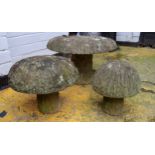 Three graduated Derbyshire gritstone straddle stones / mushrooms, 20th century