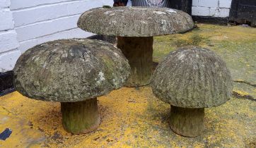 Three graduated Derbyshire gritstone straddle stones / mushrooms, 20th century