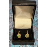 A pair of 9ct gold earrings set with oval black opals, 2.65g gross