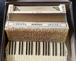 An Hohner Tango IV accordion, cased