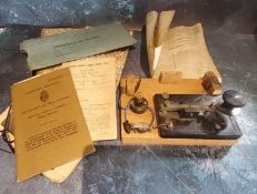 World War II - a morse code machine;  German maps;   Certificate of Service;   Private Pilot's