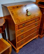 A 20th century yew fall front bureau, with four graduated cockbeaded drawers, bracket feet, 100cm