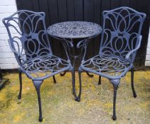Outdoor furniture - a cast metal bistro set including table and two Art Nouveau inspired chairs,