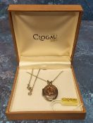 A Clogau Tree Of Life silver locket with applied 9ct rose gold in form of sinuous leaves and