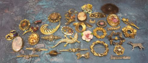 Vintage brooches including a white metal mounted cameo, Limoges brooch, a tigers eye set brooch,