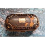 A 19th century tortoiseshell and gold coloured metal pique purse, with shield cartouche, 6.5cm wide,