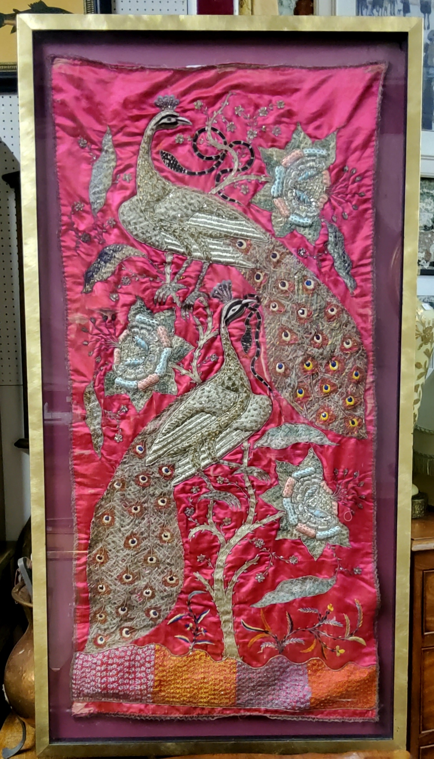 Textiles - a large early 20th century Indian silk embroidery of two peacock, serpents and the tree