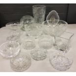 Glassware - a heavy cut glass vase;  others;  bowls;  tray;  etc