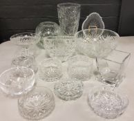 Glassware - a heavy cut glass vase;  others;  bowls;  tray;  etc