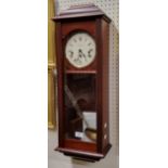 A Sewills of Liverpool mahogany wall clock, three winding holes, eight day movement striking on