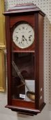 A Sewills of Liverpool mahogany wall clock, three winding holes, eight day movement striking on