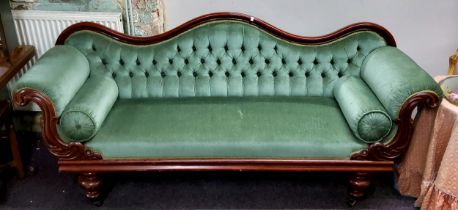 A Victorian mahogany lyre-arm sofa, serpentine back, stuffed-over upholstery, turned legs,