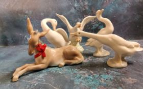 Four Lladro geese, various poses;  a Lladro ass/donkey foal (5)